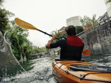 Matteo kayaking through the city, Zurich